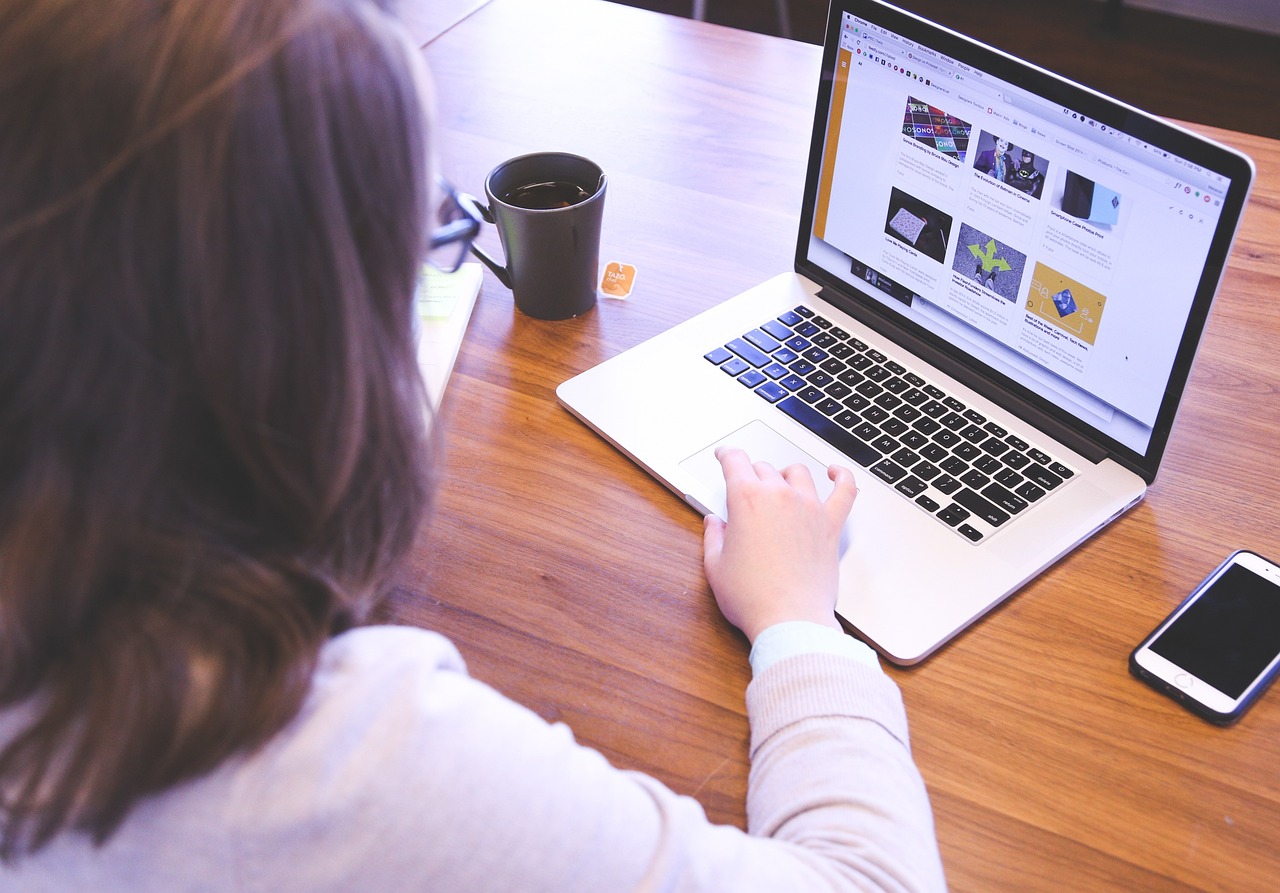 Woman looking at her laptop